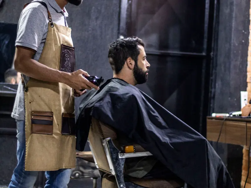 Barber working at the chair (example photo)